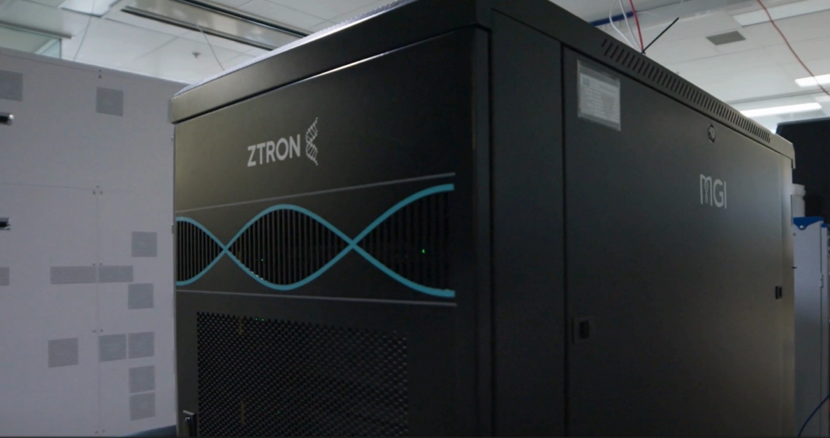 A large laboratory instrument decorated with a DNA motif and a logo that says "ZTRON."